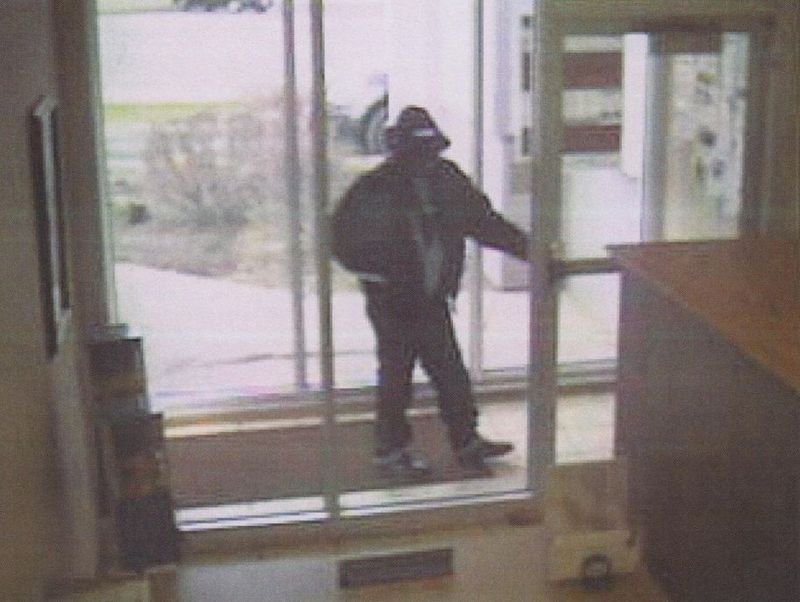 Girard police release surveillance photos of alleged bank robber WFMJ