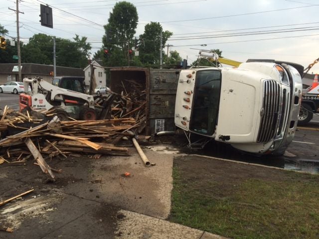 Crews clean fluids from street after truck accident in Boardman