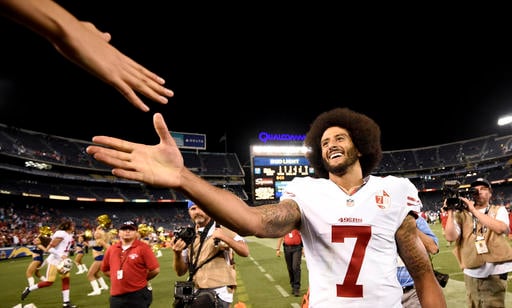 49ers quarterback Kaepernick refuses to stand for anthem in protest