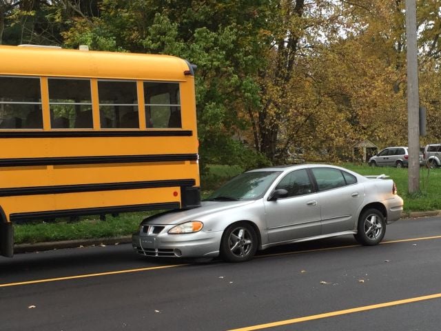 Car Slides Under Youngstown School Bus - WFMJ.com