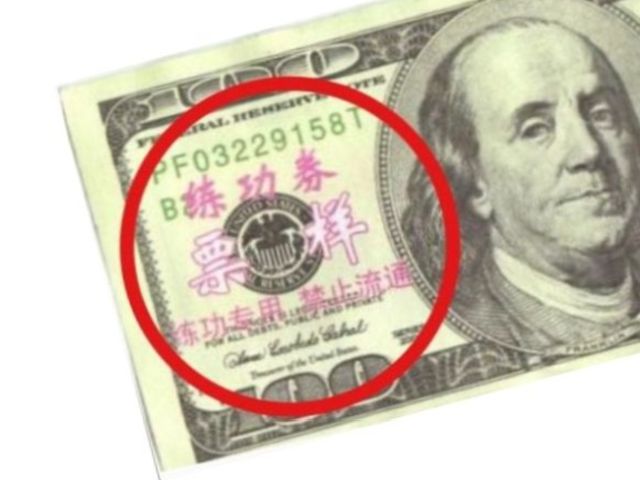 Counterfeit bills marked with Chinese letters being circulated