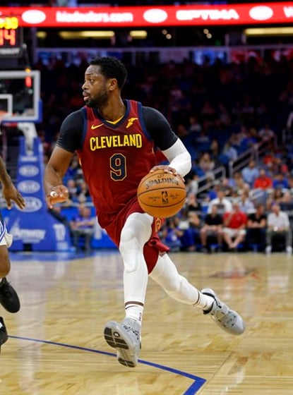 The Cleveland Cavaliers' Dwyane Wade takes a moment while medical