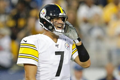 Roethlisberger, Steelers in playoffs after OT win