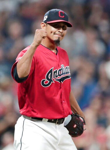 Cleveland Indians relief pitcher Carlos Carrasco pumps his fist after the Indians defeated the Philadelphia Phillies 5-2 in a baseball game, Friday, Sept. 20, 2019, in Cleveland.