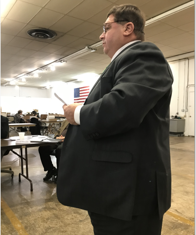 Newton Falls Councilman Lyle Waddell argues his case to the board of elections.
