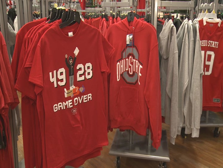 Fans picked up t-shirts, hats and game day essentials ahead of the national title game Monday night.