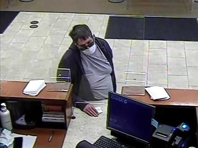 UPDATE: Omaha Police release photos from bank robbery at Bank of the West