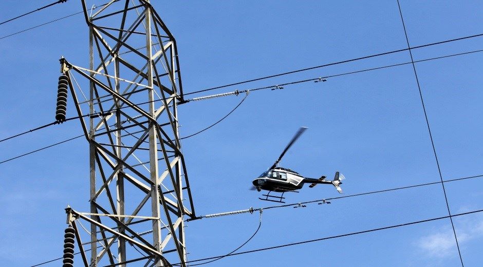 Helicopter crews working on power lines in Columbiana, and 4 other