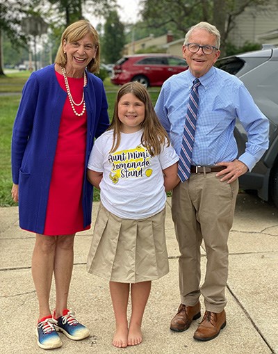 First lady Fran DeWine, with Annalise Kenyon, 8, and Ohio Gov. Mike DeWine on Monday, Sept. 5