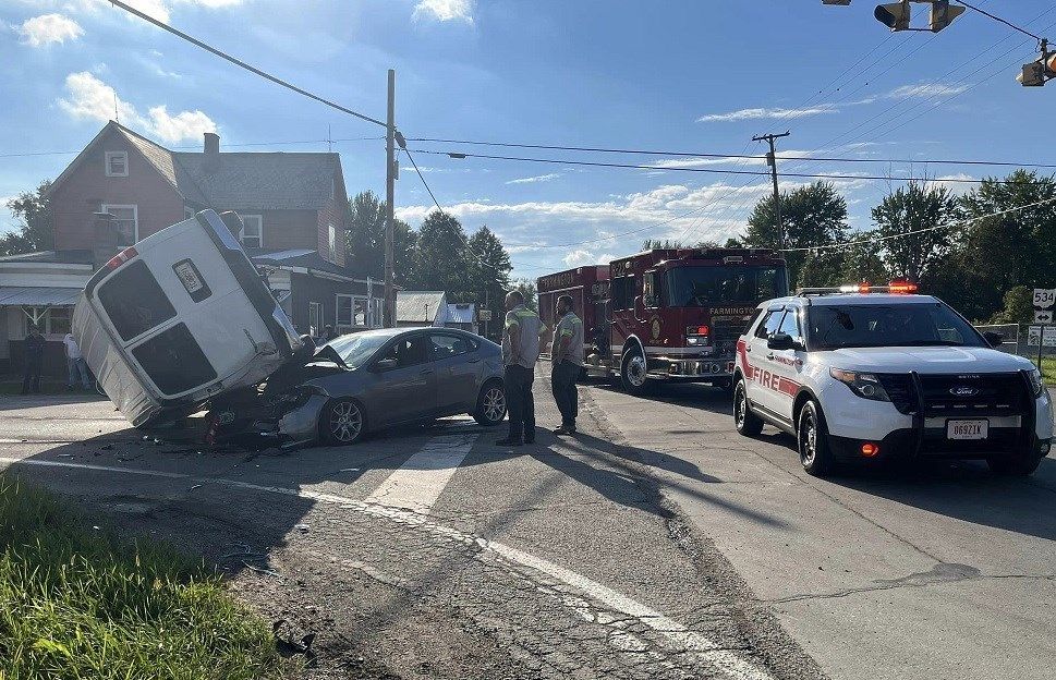 Van rolls over in Farmington crash