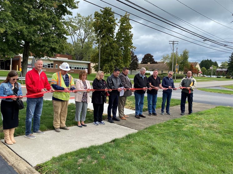 vienna leaders celebrate new sidewalk