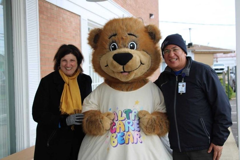 Dr. Elana Rossi (Akron Children's physician), Buddy (The Alta Care Bear) and Mario Morelos (Akron Children's External Affairs)