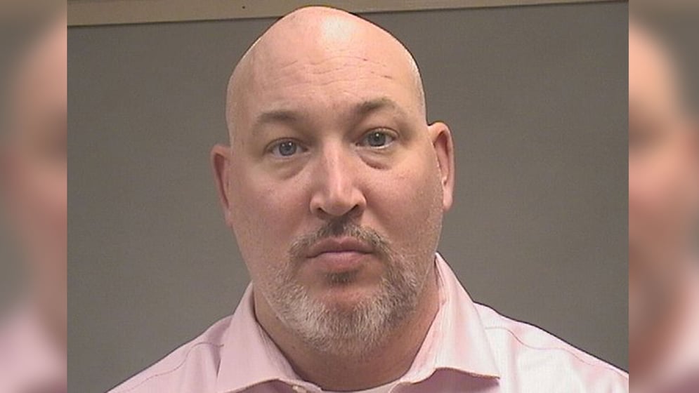 Man accused of searching law enforcement database when working as a Man accused of searching law enforcement database when working as a