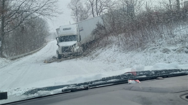 The semi left the roadway, crashing onto the road next to Interstate Thursday. Courtesy of Shyann Poling