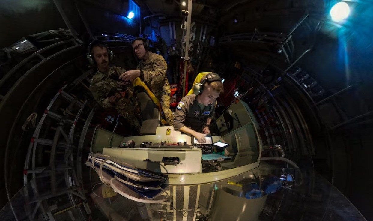 erial spray qualified loadmasters, assisted by a medical entomologist, operate a 910th Airlift Wing Modular Aerial Spray System aboard an aerial spray-modified C-130H Hercules aircraft dispersing mosquito control product.