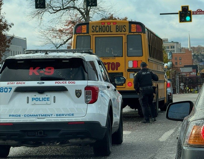 School bus hits back of car near Ursuline High School