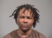 Bond set at $50,000 for Warren man accused of punching dog