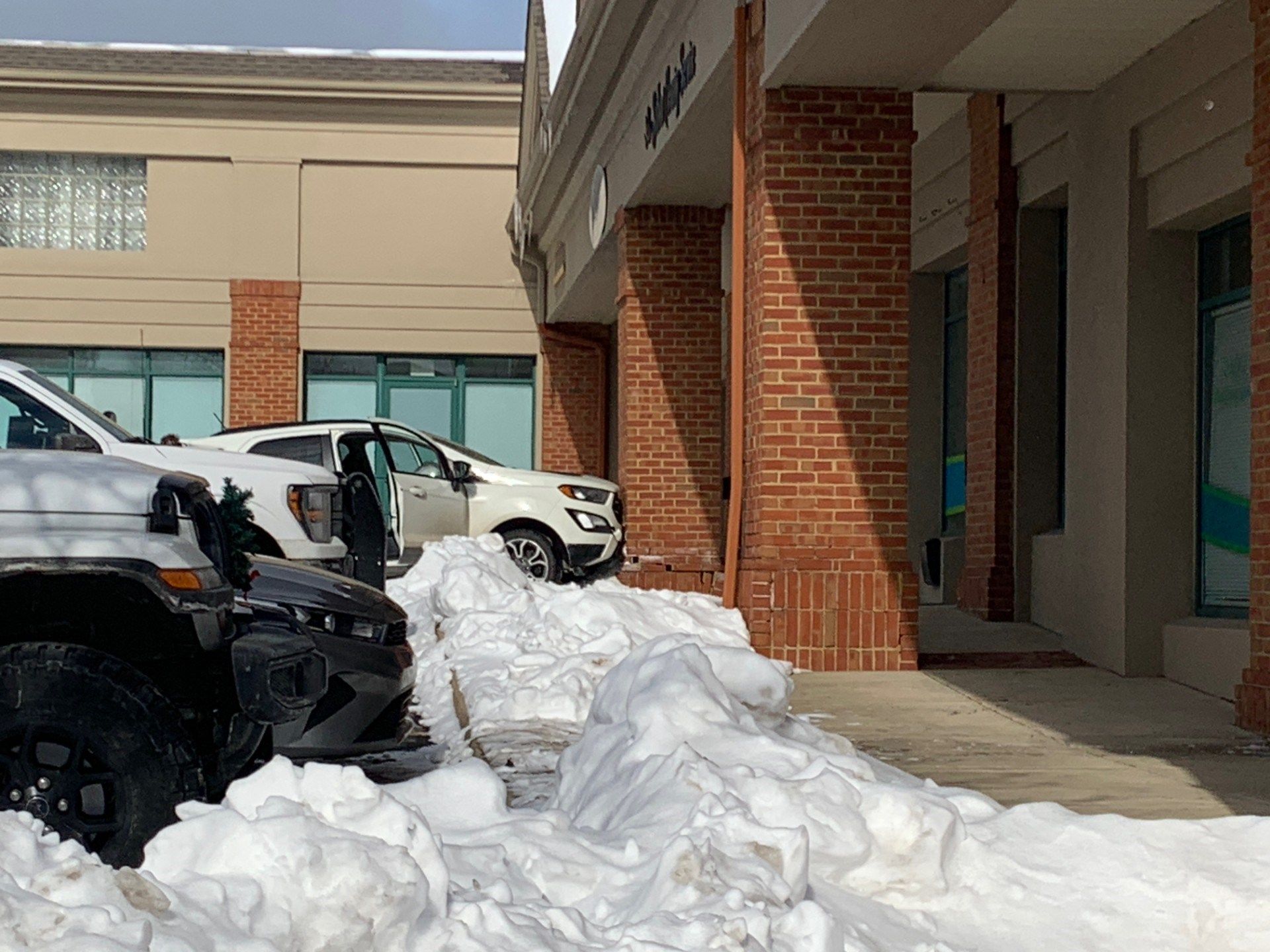 Two taken to hospital after car crashes into column in Boardman plaza