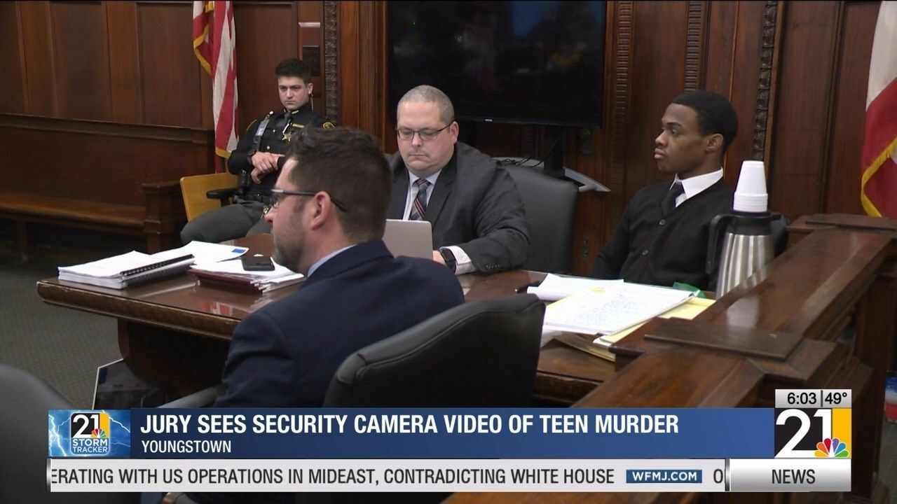 Jury sees security camera video of teen murder