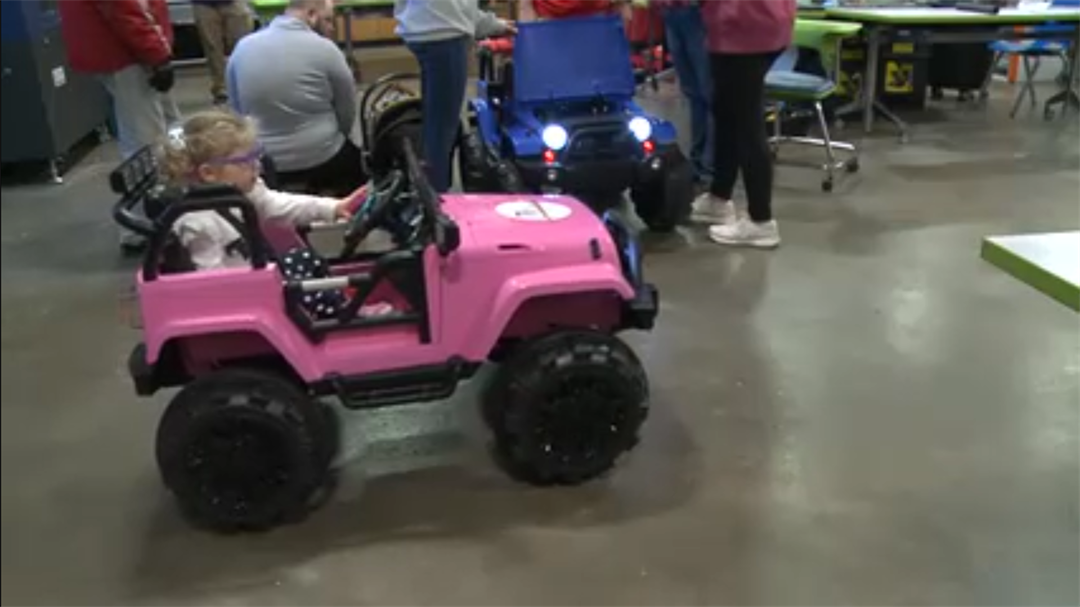 Children with disabilities receive free small car at Go Baby Go
