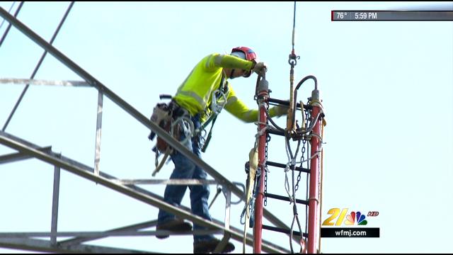 First Energy goes to great lengths and heights to provide power - WFMJ.com