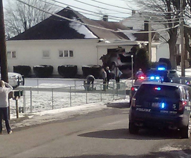 Man in jail after car crashes into East Liverpool house during police